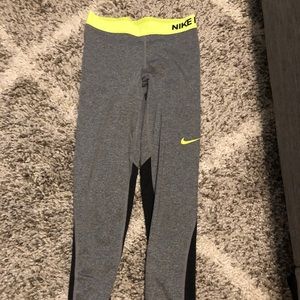 Nike Pro leggings with black and green detailing